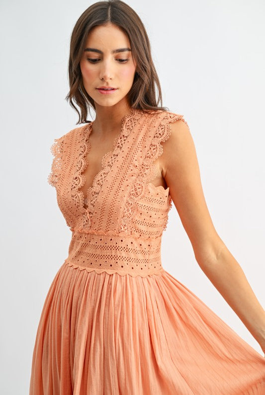 Orange lace boho midi dress, close-up of lace bodice detail