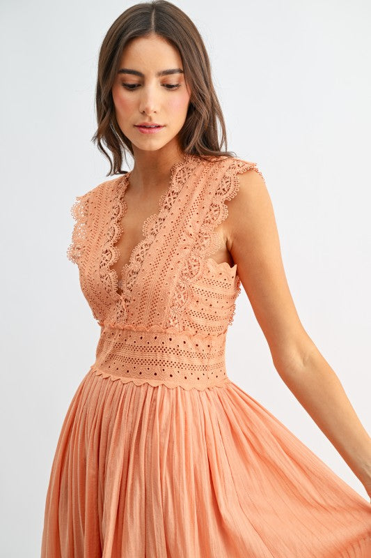 Orange lace boho midi dress, close-up of lace bodice detail