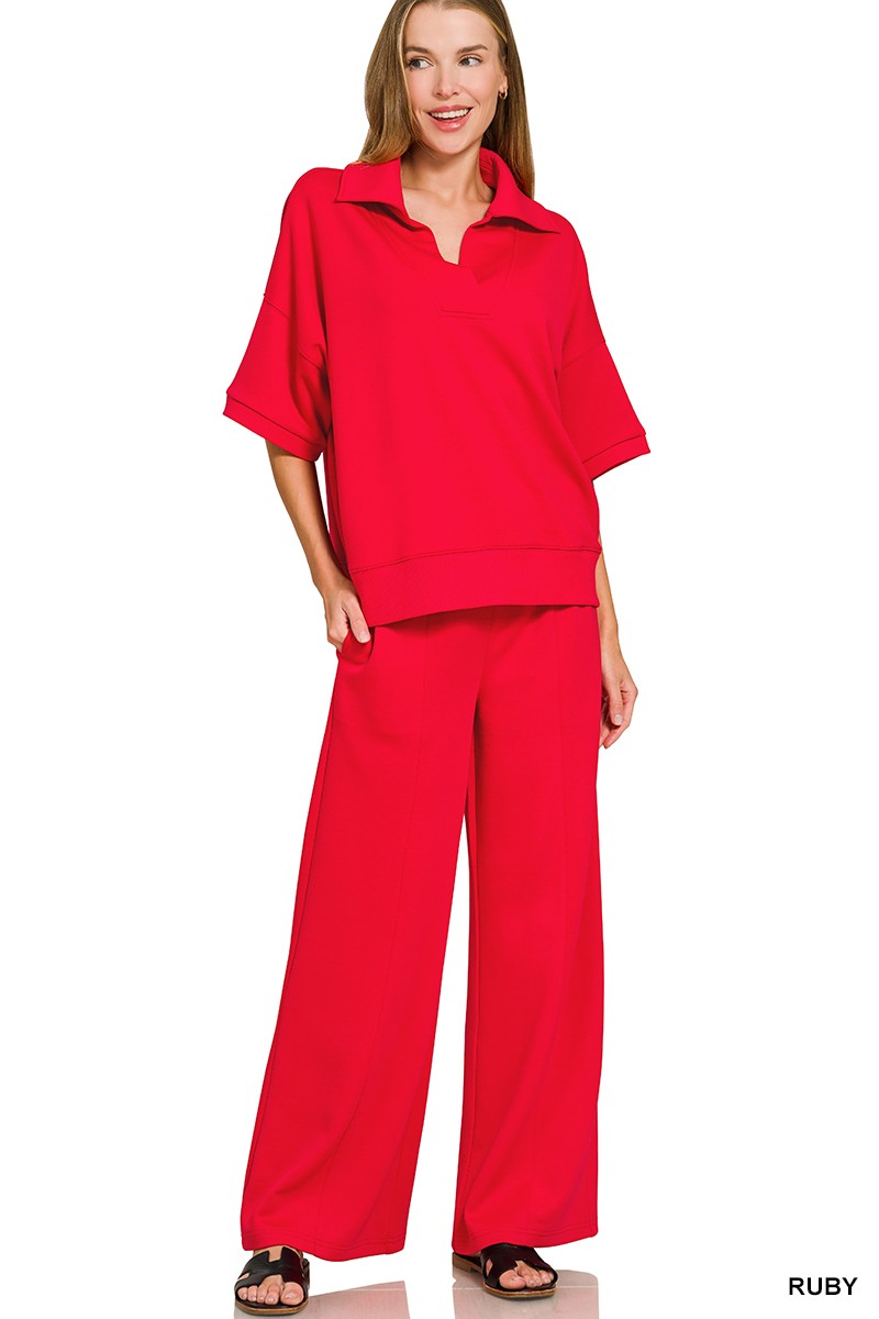 Woman wearing a red outfit on a white background