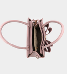 Pink butterfly-shaped handbag on a light gray background